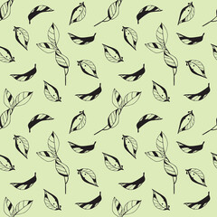 Graphic black vector seamless pattern with leaves on the green background.Texture for wrapping paper, fabrics, decor, banners.