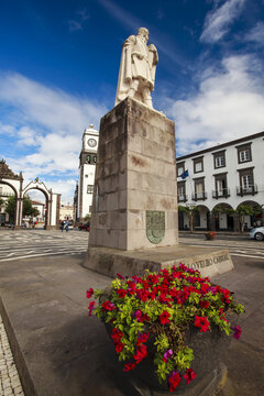 Statue of Goncalo Velho Cabral alongside the city gates in Ponta Delgada, on the island of Sao Miguel; Ponta Delgada, Sao Miguel, Azores, Portugal