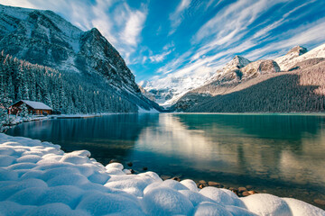 Lake Louise with snow in autumn, Banff National Park; Alberta, Canada
