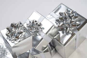 Shiny silver wrapped gifts; Studio