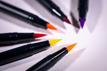 brush-tip markers in various colors