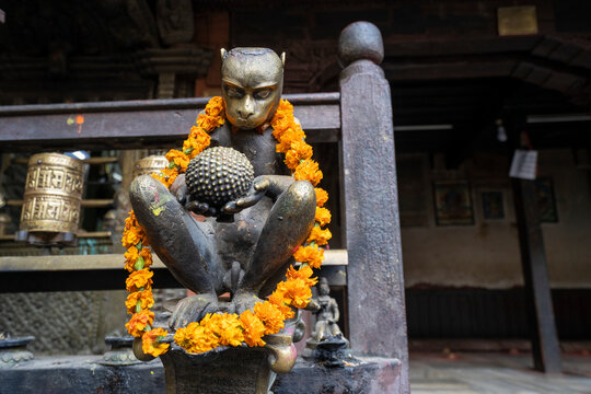 Brass monkey, Kwa Bahal Golden Temple in the old city of Patan or Lalitpur, Kathmandu Valley, Nepal