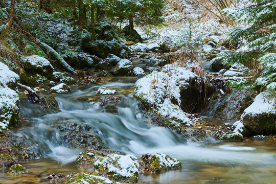Snowy waterfall, Janosikove Diery in Mala Fatra National Park; Terchova, Slovakia