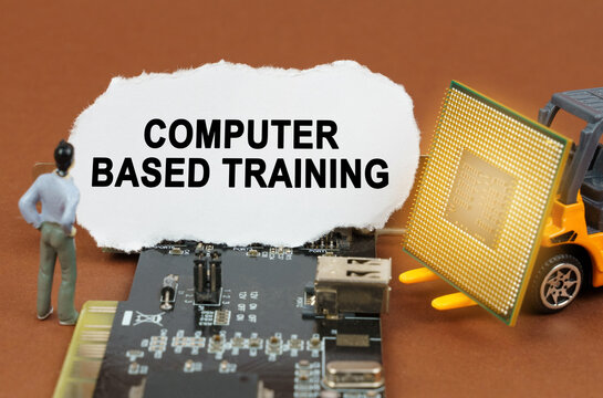 On the board with microcircuits lies a paper plate with the inscription - Computer Based Training