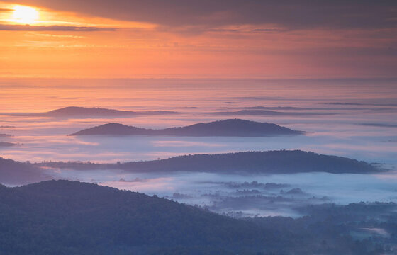 Autumn morning mist shrouds the Shenandoah Mountains in the Blue Ridge Mountains of Virginia.