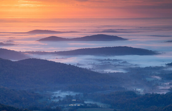 Autumn morning mist shrouds the Shenandoah Mountains in the Blue Ridge Mountains of Virginia.