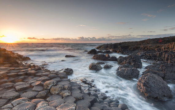 Sunset at the Giant's Causeway, a UNESCO world heritage site of some 40,000 hexagonal columns on the Antrim coast of Northern Ireland.