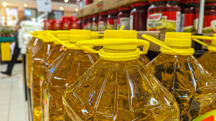 Sunflower oil in bottles on the counter in the supermarket