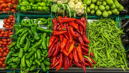 Fresh fruits and vegetables on the supermarket counter. Healthy foods