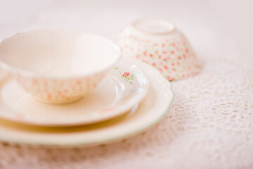 Closeup of porcelain plates and bowls