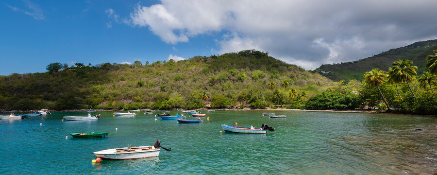 Motorboats moored in the bay at the anchorage of Anse a la Barque on Basse-Terre; Guadeloupe, French West Indies