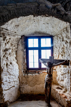 Christ on the cross in an alcove of Harman Saxon fortified church near Brasov, Transylvania, Romania; Brasov, Transylvania, Romania
