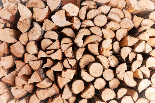Detail photo of firewood which has been cut, split and stacked; Kalskag, Southwestern Alaska, Alaska, United States of America