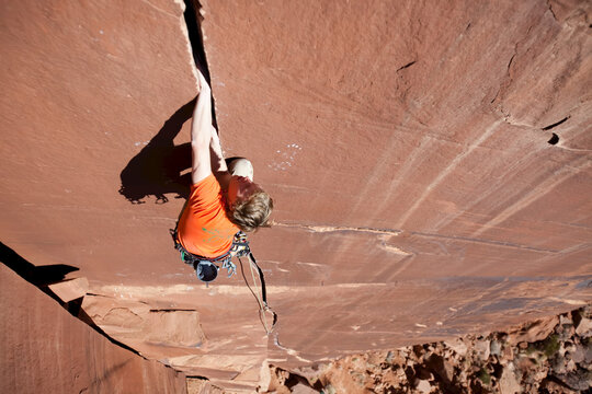 A climber traditionally climbs 'Desert Moon,' a 5.11 on the Catwall.