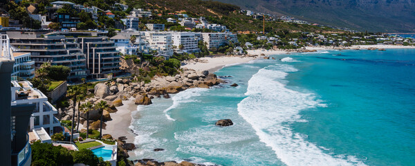 Beachfront buildings along the Atlantic Ocean at Clifton Beach; Cape Town, Western Cape, South Africa