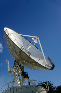 Satellite dish in a blue sky; Punta Arenas, Patagonia, Chile