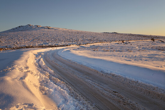A wintery view of the Haytor to Ashburton Road at Rippon Tor, near Bovey Tracey in Dartmoor National Park; Devon, England