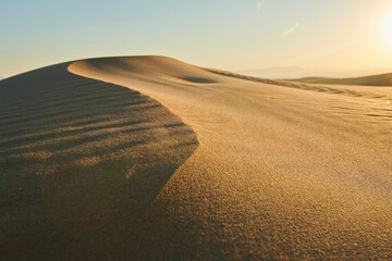 Rippled sand dunes in sunset light, Ebro River Delta; Catalonia, Spain