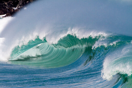 Close-up of wave breaking on the north shore of Oahu at Waimea; Waimea, Oahu, Hawaii, United States of America