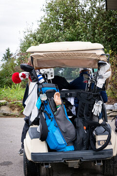 Golf cart with arm prothesis in the back; Okotoks, Alberta, Canada