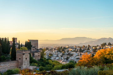 Sunset over ancieat arabic Alhambra in Granada, Spain on November 26, 2022
