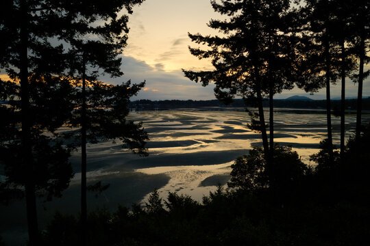 Parksville Beach Sunrise Vancouver Island. Sunrise at low tide in Craig Bay, Parksville, British Columbia.

