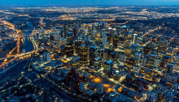 Aerial evening view of downtown and the Bow River in Calgary, Alberta, Canada; Calgary, Alberta, Canada