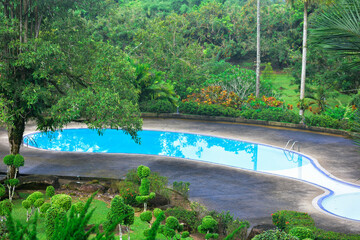 Swimming pool Blue water is a pool for swimming in the resort.