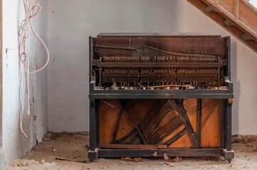 Old abandoned palace mansion with piano in Poland 