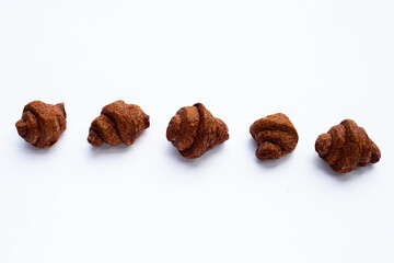 Mini chocolate croissant on white background.