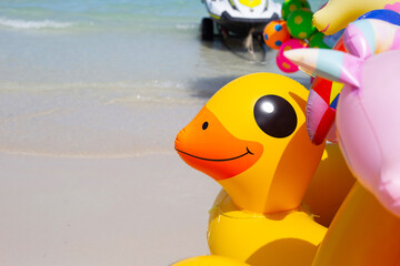 Inflatable rings on the beach. Summer concept