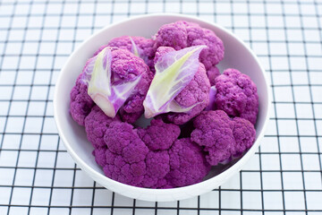 Purple cauliflower on white background.