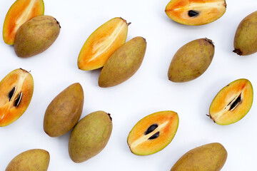 Fresh sapodilla fruit on white background