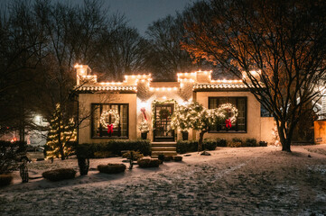 A house decorated for Christmas in a middle class neighborhood.