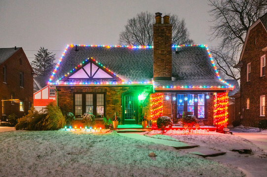 A House Decorated For Christmas In A Middle Class Neighborhood.