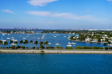Fototapeta na wymiar Beautiful aerial panoramic view of the city of Miami, its buildings, marina, yachts and luxurious suburbs houses