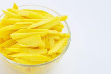 Preserved bamboo shoot on white background.