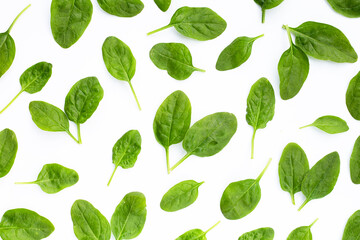 Spinach leaves on white background.