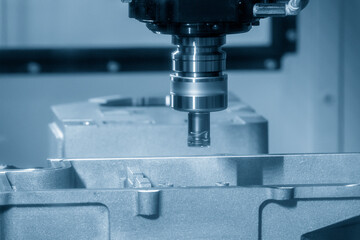 Fototapeta na wymiar The CNC milling machine rough cutting the injection mold parts by indexable tools.