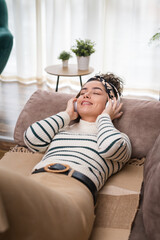 one woman doing guided meditation yoga self care practice at home