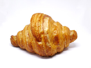 Delicious and fresh french croissants on a white background.