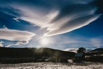 Dramatic clouds over a snowy winter wonderland in Nederland, Colorado - Rocky mountains in the winter