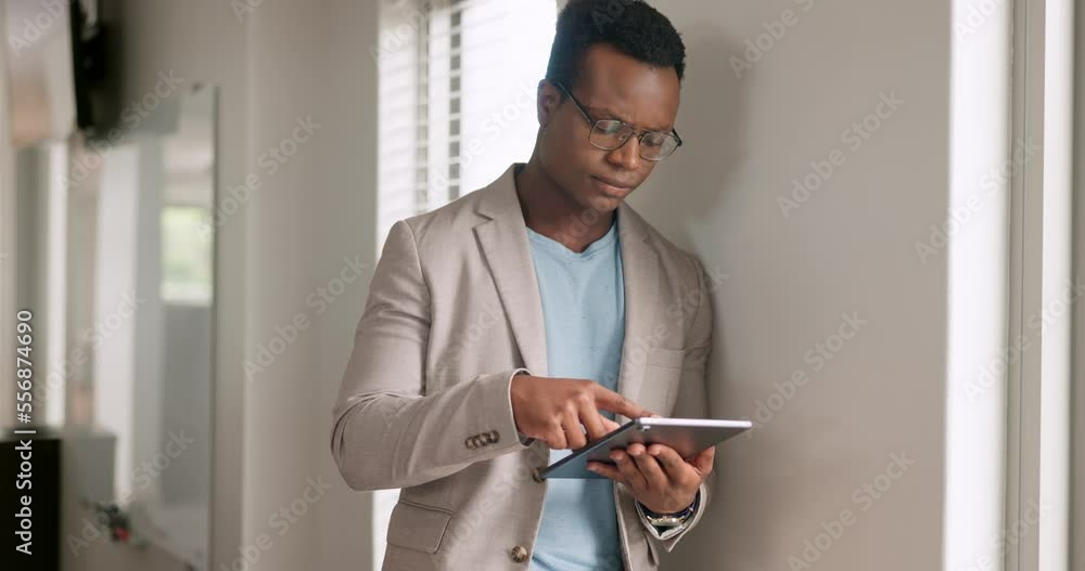 Poster tablet, thinking and research with a business black man leaning against a wall in his office at work