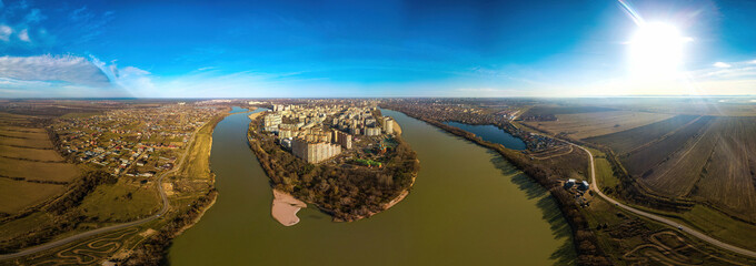 aerial panorama landscape over the steep bend of the Kuban River near the Rozhdestvensky park and Lake Brzegokai on a sunny day at the end of autumn - obrazy, fototapety, plakaty