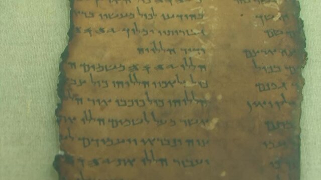 Dead sea scrolls close view behind frame, Israel
Also Known as the Qumran Caves Scrolls, Israel, 2022
