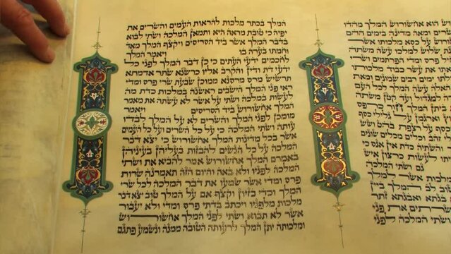 Scrolling the Book of Esther, Israel 2022
Male hands Scrolling Megillat Esther, Israel, 2022 
