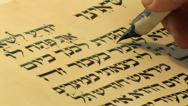 Jewish Sofer writes a Hebrew Passover Haggadah, close view
a Jewish text that sets forth the order of the Passover Seder, Israel, 2022 
