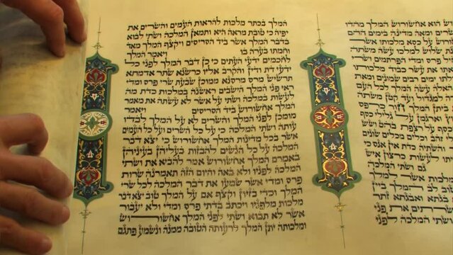 Scrolling the Book of Esther (Megillat Esther), Close up
Male hands Scrolling Megillat Esther, Israel, 2022 
