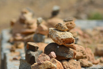 Stones are balanced on top of each other. Symbol of equilibrium and Zen