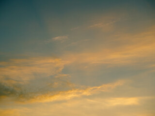 Yellow soft clouds against the evening sky
